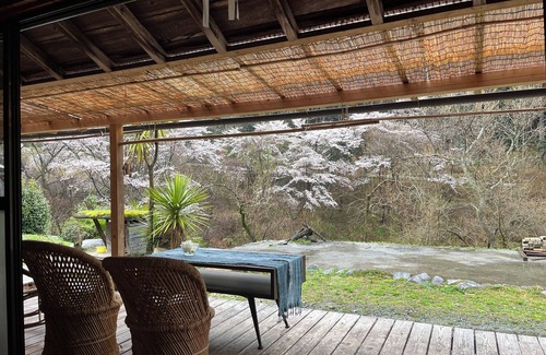Matsusaka House | An old house with a spacious kitchen surrounded by mountains and clear streams