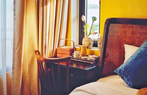 Hoi An Hotel | Ancient and modern decoration, room overlooking Thu Bon river. Enjoy your time
