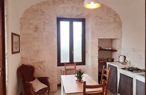 Ostuni Apartment | Ancient tower in the countryside, surrounded by greenery, 6 km from Ostuni (Br).