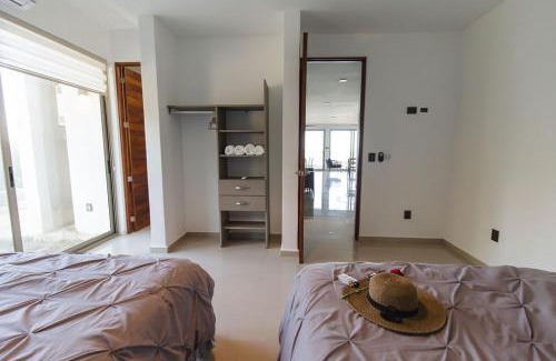 Villa Juarez Apartment | Angelina 28 Beachfront and Family Apartments - Modern and Relaxing Long Stays - 20 min from Cancun Airport