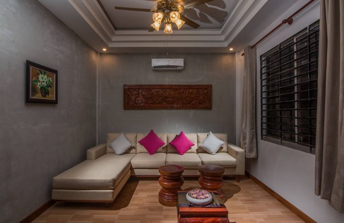 Siem Reap House | Angkor Sunshine is a fist floor private villa with 3 rooms, large sitting area.