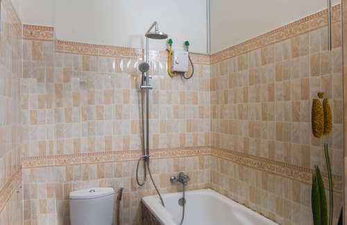Siem Reap House | Angkor Sunshine is a fist floor private villa with 3 rooms, large sitting area.