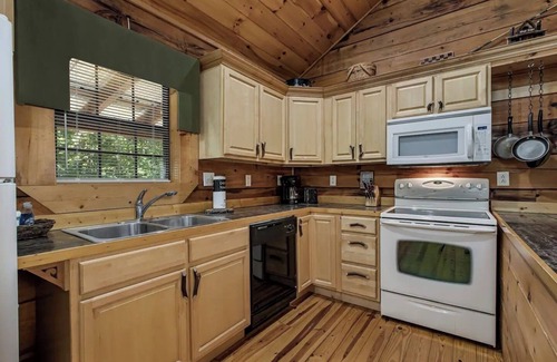 Tellico Plains Cabin | Angler cabin. This modern private studio Cabin with HOT TUB is tucked away in a wooded cove.