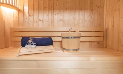 Dorumer Neufeld Apartment | Ankerpunkt Südost - Ferienwohnung mit Garten und Sauna