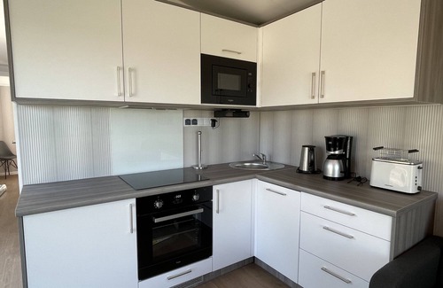 Fehmarn House | Anne Bonny sea view Tiny House in the garden of the Teichhof