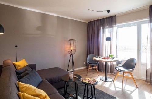 Spiekeroog Apartment | Antares Spiekerooger Gästehaus-Sonnengartenbalkon Süd mit Blick aufs Wattenmeer - Wohnung 7