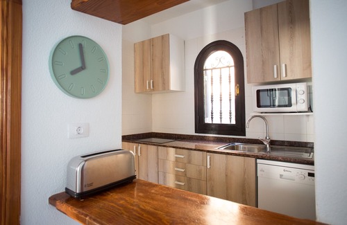 Puerto Rico Apartment | Apartamanto with terrace, free WiFi, communal pool in Puerto Rico