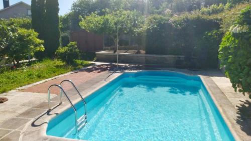 Samieira Apartment | Apartamento con jardín y piscina temporada verano privados