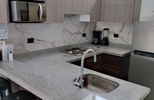 Zona Dorada Apartment | Apartamento con Piscina, Cerca de la Playa