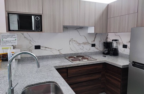 Zona Dorada Apartment | Apartamento con Piscina, Cerca de la Playa