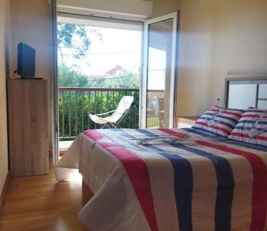 Aguino Apartment | Apartamento delante de la playa.