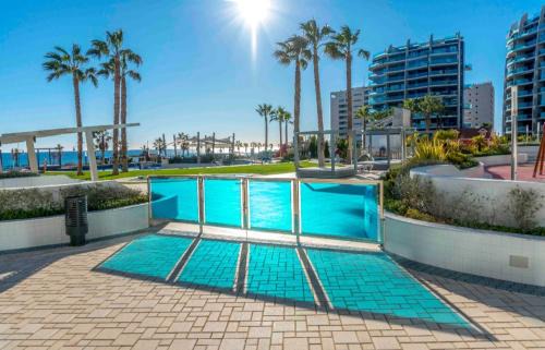 Punta Prima Apartment | Apartamento Dos Amigos, Sea Senses , sea view and 3 swimming pools, one heated , parking space