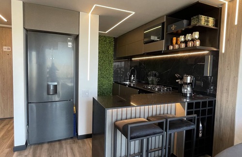 Suba Apartment | Apartasuite de Lujo Inteligente con Chimenea