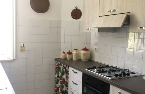 Santa Caterina Apartment | Apartment in villa with terraces overlooking the garden 150 m from the sea
