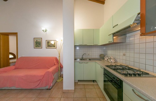 Donoratico Apartment | Apartment 'Agnese 1 Bilocale Con Giardino' with Private Terrace, Shared Garden and Wi-Fi