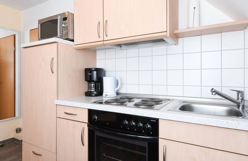 Esens Cottage | Apartment Amrum - Pension Nordkap in Bensersiel