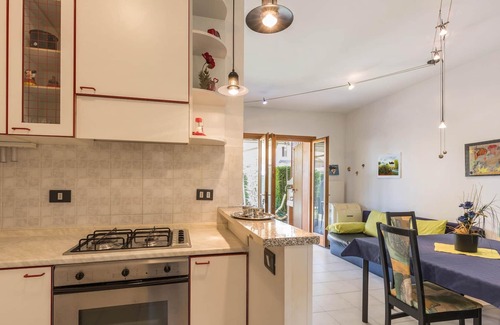 Colà Di Lazise Apartment | Apartment "BELLA ITALIA" in Lazise on Lake Garda with Pool & Sports Area, Private Sun Terrace with Barbecue, Fenced Lawn & Private Parking