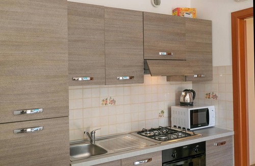 Suvereto Apartment | Apartment Bilocale Canino with Terrace, Shared Pool & Wi-Fi