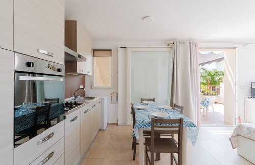 Santa Maria al Bagno Apartment | Apartment 'Bouganvillea' with Sea View, Shared Terrace and Air Conditioning