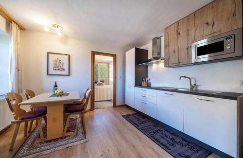 Schenna Apartment | Apartment “Brunjaunhof” on a Farm with Mountain View, Balcony & Garden