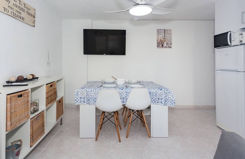 Los Delfines Apartment | Apartment 'Cala En Forcat' with Shared Pool, Private Terrace and Wi-Fi