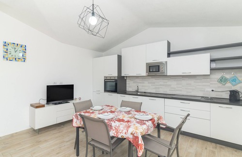 Budoni Apartment | Apartment 'Casa Virginia' with Sea View, Private Terrace and Air Conditioning