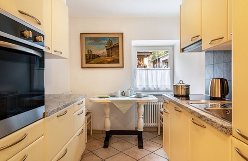 San Giovanni di Fassa Apartment | Apartment 'Ciasa Majonade Pozza Di Fassa Tipo1' with Mountain View, Private Terrace and Wi-Fi