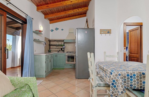 Monte Petrosu Apartment | Apartment 'Con Vista Porto Taverna' with Sea View, Private Terrace and Air Conditioning