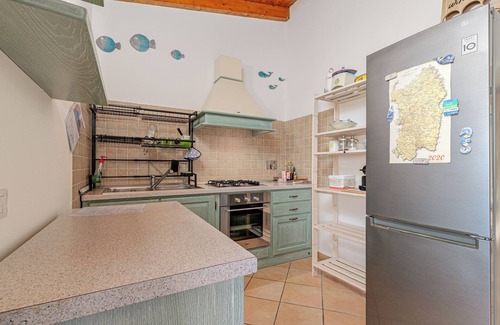 Monte Petrosu Apartment | Apartment 'Con Vista Porto Taverna' with Sea View, Private Terrace and Air Conditioning