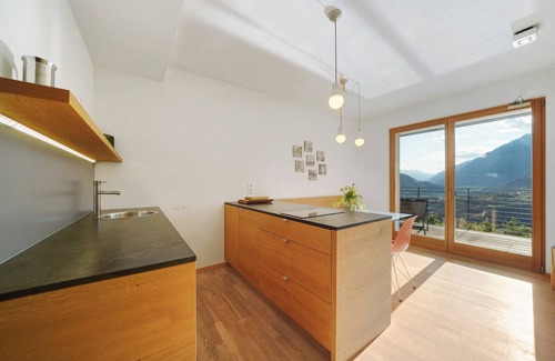 Schenna Apartment | Apartment 'Dahoam - Vistasuite' with Mountain View, Shared Pool and Wi-Fi