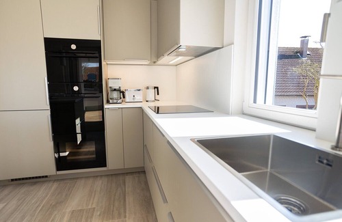 Kalifornien Apartment | Apartment 'Ferienwohnung Backbord' with Sea View, Shared Garden and Wi-Fi