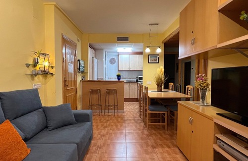 Sant Carles de la Rapita Apartment | Apartment 'Edificio Simancas' Balcony and Air Conditioning
