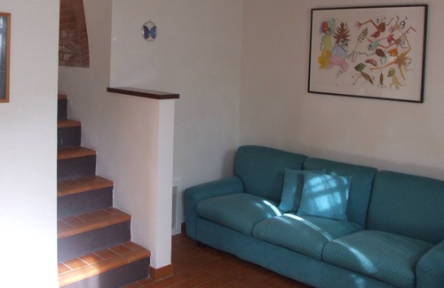 Santarello House | Apartment for couple in a farmhouse with swimming pool on the hills of Siena