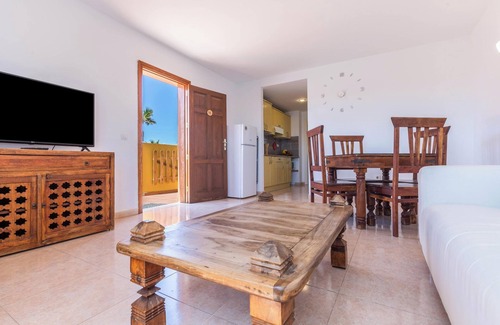 Corralejo Apartment | Apartment "Fuerteventura Harmony" with Mountain View, Terrace, Shared Pool & Wi-Fi