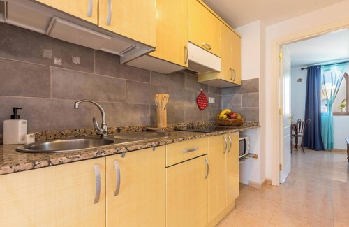 Corralejo Apartment | Apartment "Fuerteventura Harmony" with Mountain View, Terrace, Shared Pool & Wi-Fi