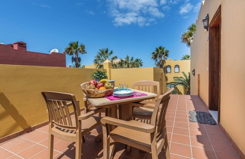 Corralejo Apartment | Apartment "Fuerteventura Harmony" with Mountain View, Terrace, Shared Pool & Wi-Fi