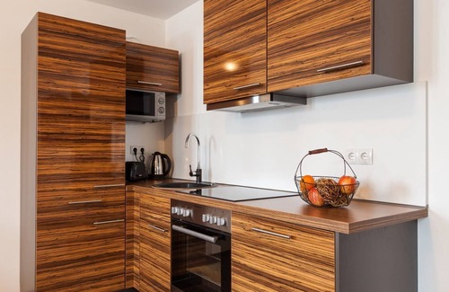 Hopfen am See Apartment | Apartment "Guinness Suite" in the Vitusfort house