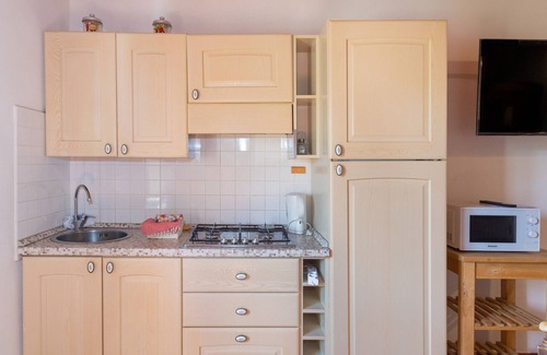 Donoratico Apartment | Apartment 'I Cavalleggeri - Bucefalo' with Shared Pool, Shared Garden and Wi-Fi