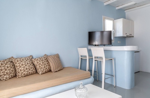 Kionia Apartment | Apartment In A Hotel 'Ninemia Suites Tinos Grand 203 ' with Sea View, Wi-Fi and Air Conditioning