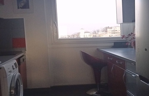 Cite Rouge Apartment | Apartment in a typical neighborhood overlooking Paris and the Eiffel Tower.