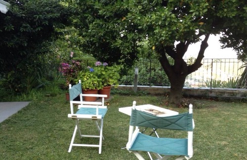 La Foce Apartment | Apartment in early 20th century villa with garden