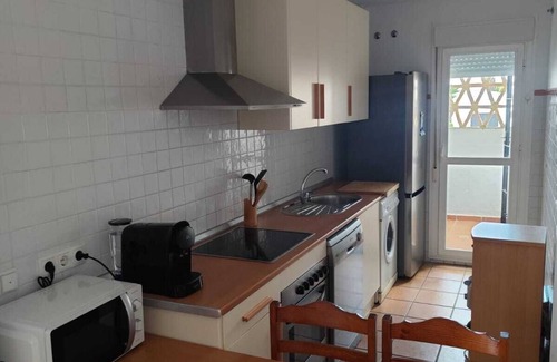 Isla Cristina Apartment | Apartment in Islantilla (Golf) with magnificent common areas and swimming pool.