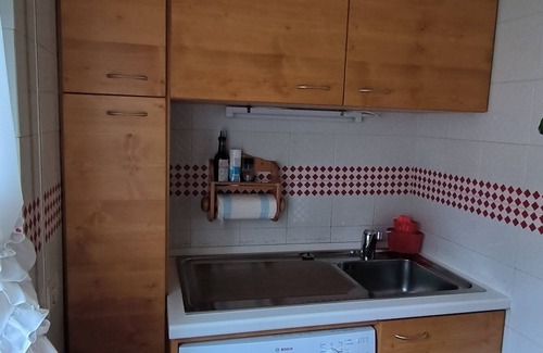 Cortina d'Ampezzo Apartment | Apartment in the center with mountain views, a stone's throw from the cable car