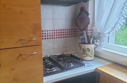 Cortina d'Ampezzo Apartment | Apartment in the center with mountain views, a stone's throw from the cable car