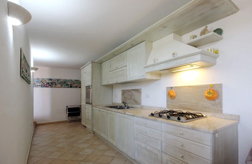 Porto San Paolo Apartment | Apartment in villa with splendid sea and garden view