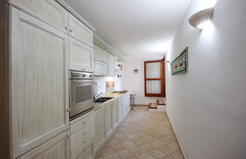 Porto San Paolo Apartment | Apartment in villa with splendid sea and garden view