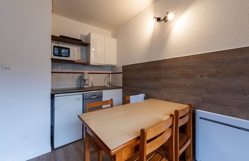 Les Esserts Apartment | Apartment in Morillon with Pool & Mountain Views