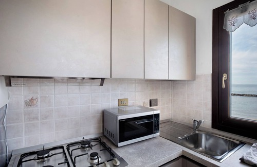 Santo Stefano al Mare Apartment | Apartment 'La Cannonata' with Sea View, Balcony and Air Conditioning