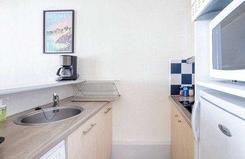 Fouesnant Apartment | Apartment 'La Cabine - Sea View on the Beach' with Sea View, Shared Pool and Wi-Fi