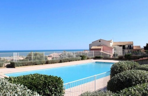 Saint-Pierre-la-Mer Apartment | Apartment 'La Perle Marine' with Sea View, Shared Pool and Wi-Fi